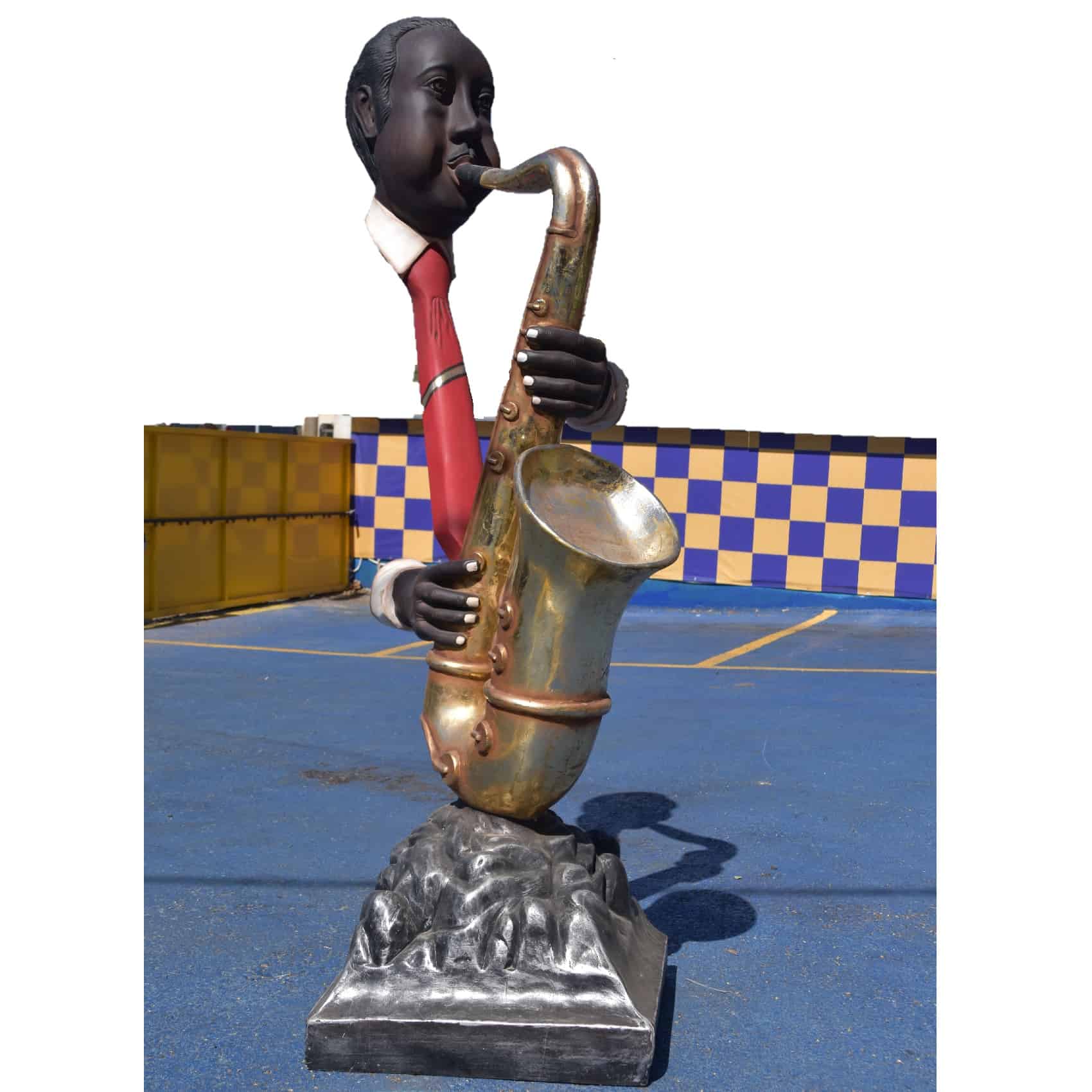 פסל נגן סקסופון ראש ידיים